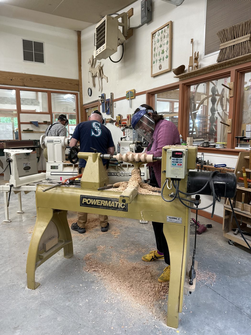 Students turning at the lathe