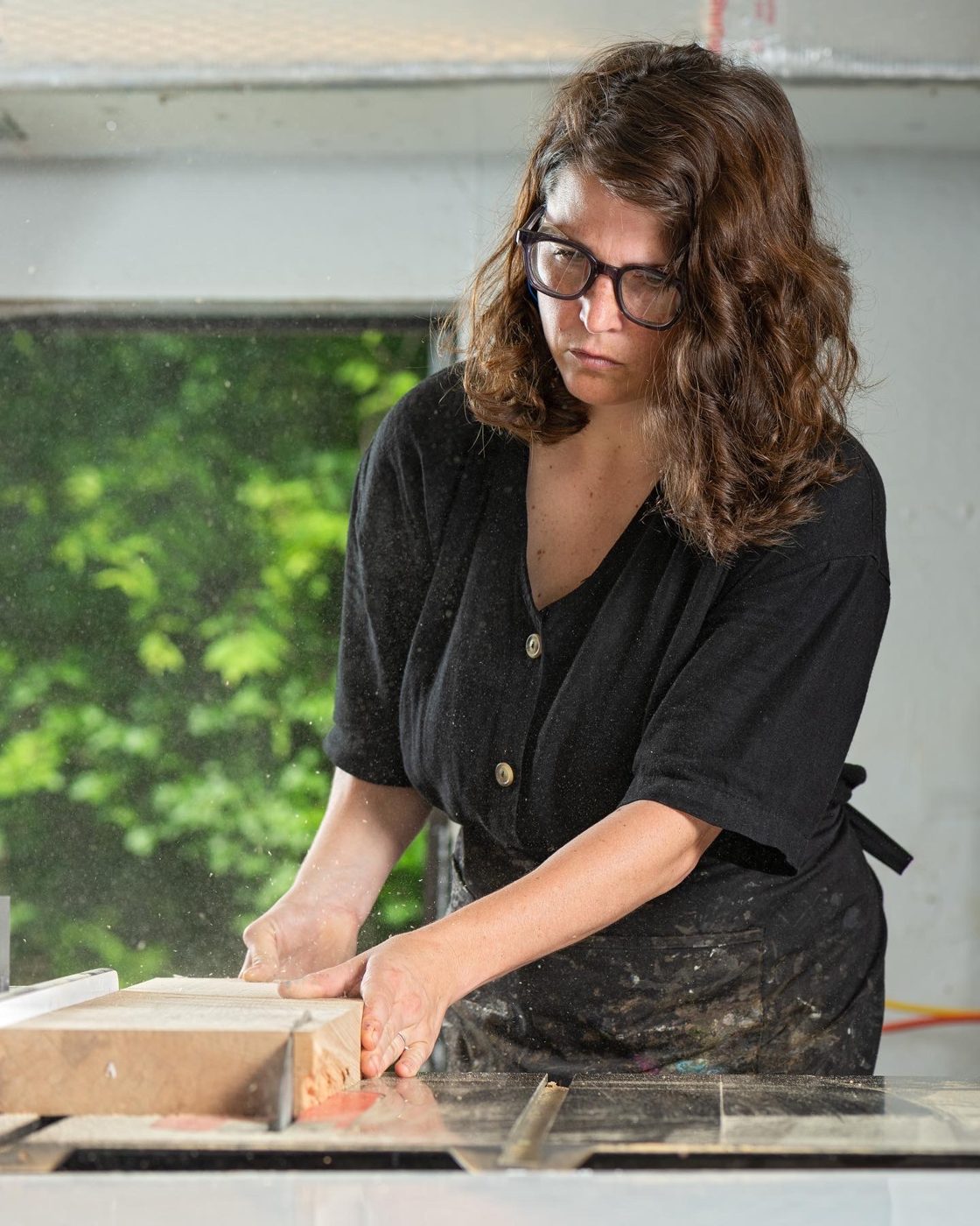 Ellie Richards at the table saw